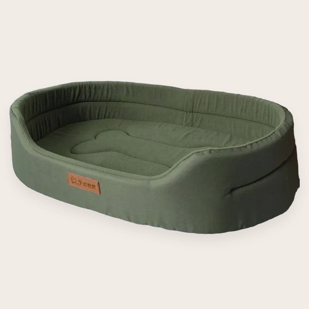 Panier pour chien ovale à rebords CANIPANI, XL — 80 × 55 cm, sur fond neutre