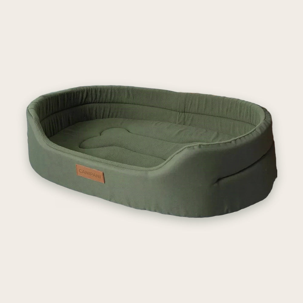 Panier pour chien ovale à rebords CANIPANI, XL — 80 × 55 cm, sur fond neutre
